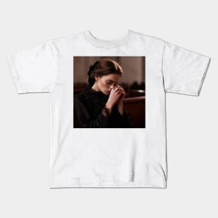 Girl crying in a moment of mourning and the comfort of faith Kids T-Shirt